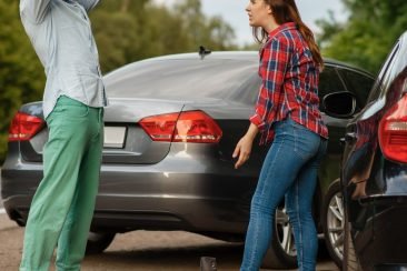 car-accident-on-road-man-and-woman-are-sorted-out.jpg